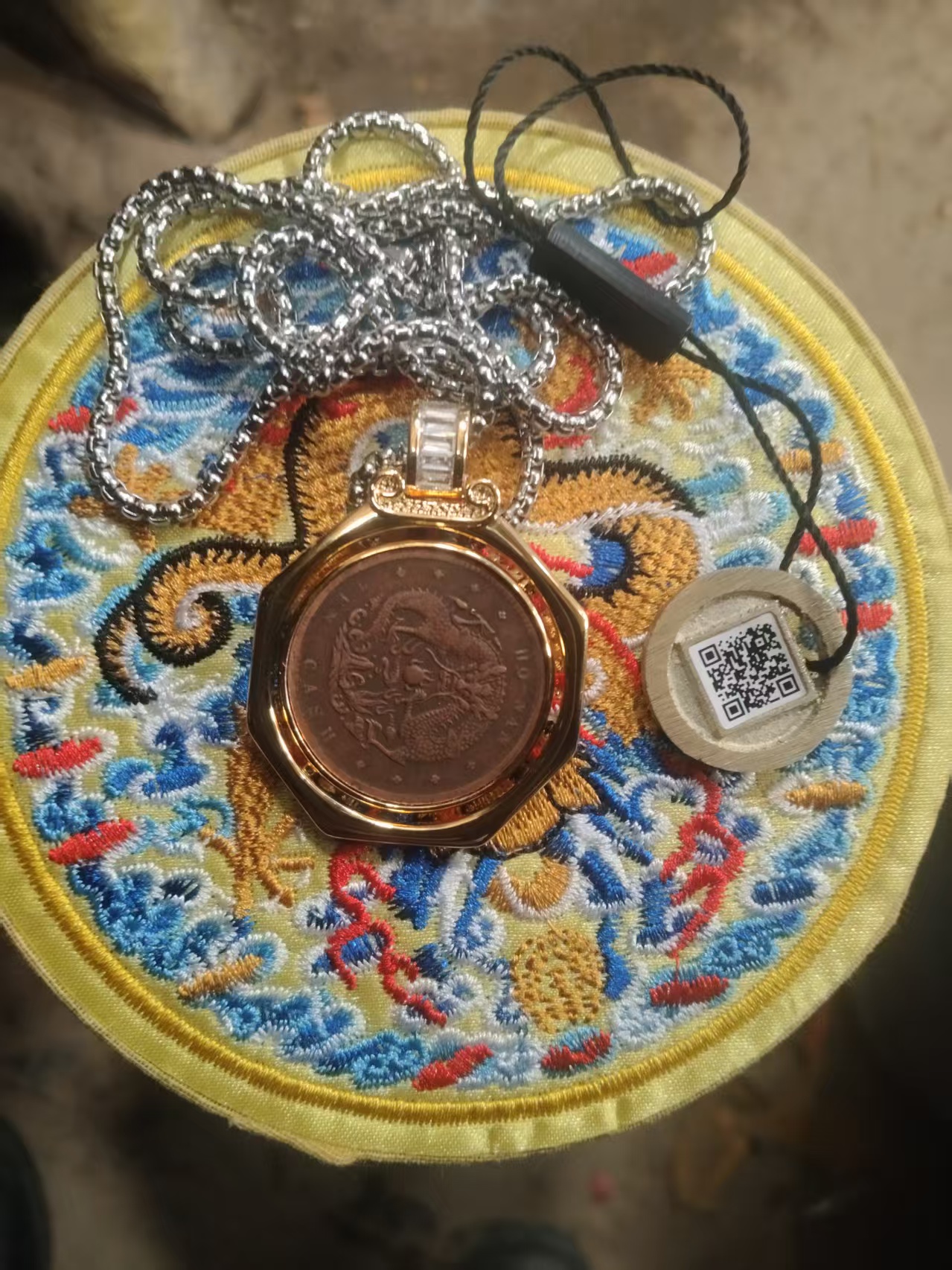 This is the Henan Province-made Guangxu Yuanbao with ten dragon stamps.