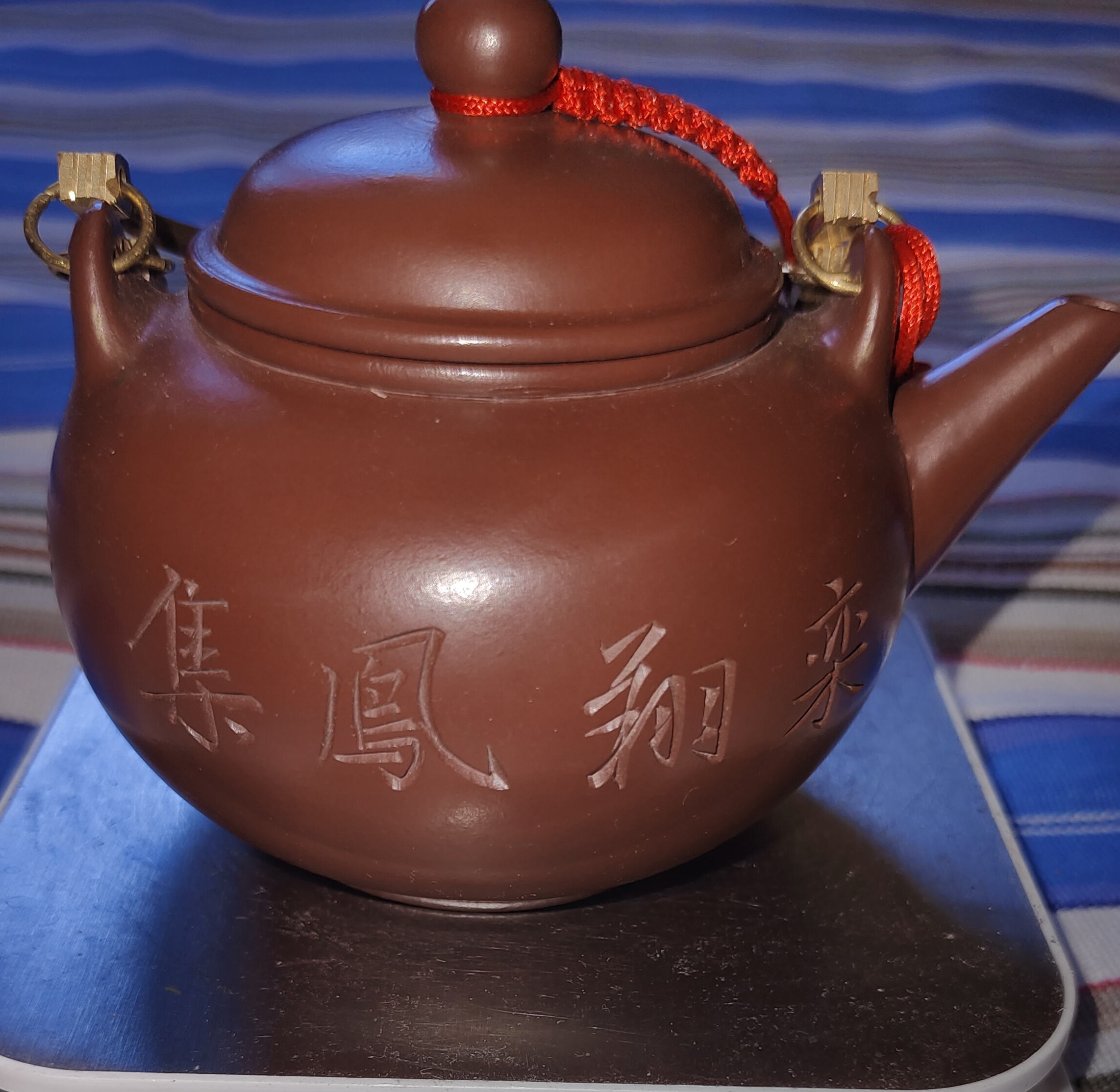 Gu Jingzhou’s purple clay pot